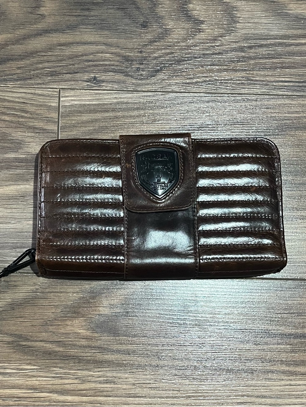 RUDSAK Brown Quilted Leather Zip Wallet with Shield Logo